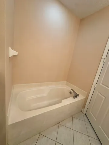 a bathroom with a bathtub