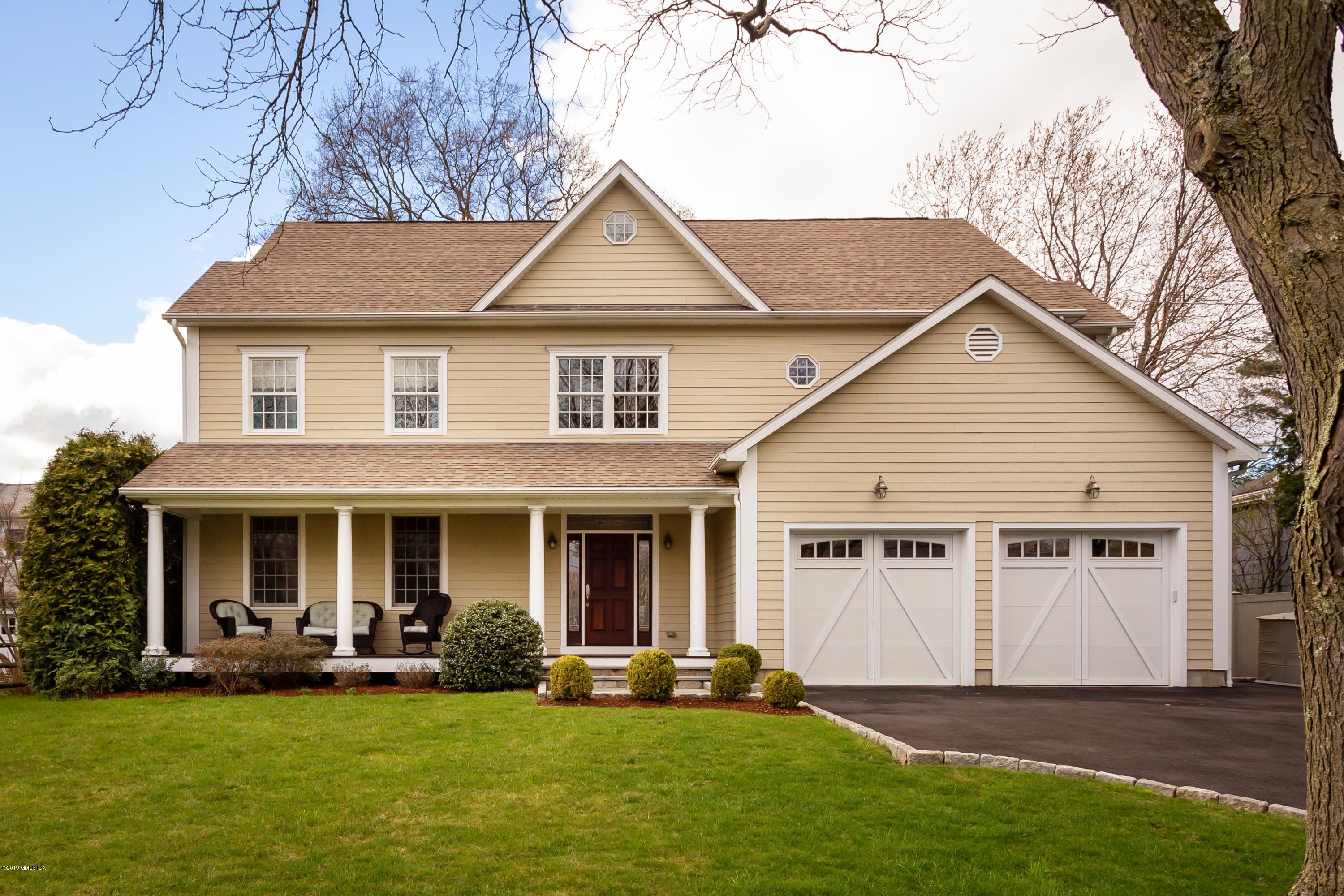 11 Tory Road Riverside, CT 06878 - Photo 1 of 29 a front view of a house with a yard