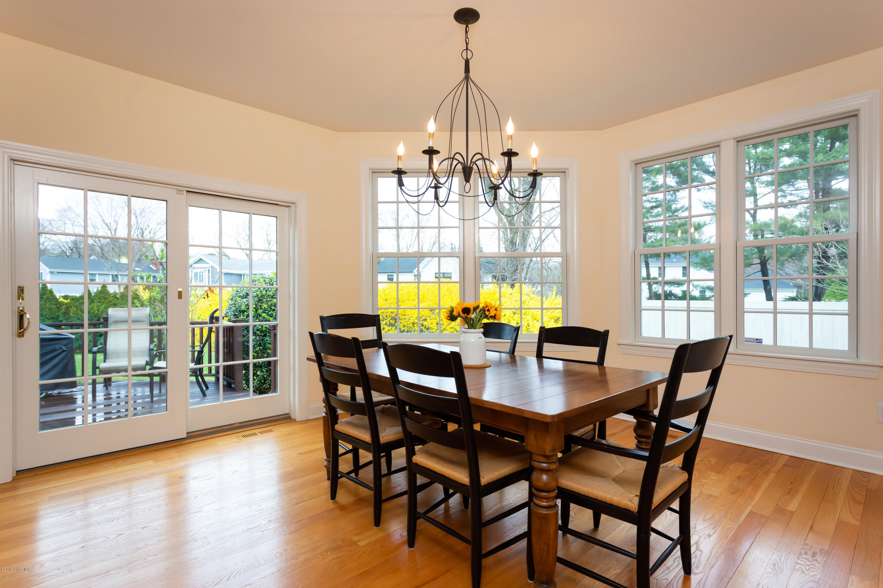 11 Tory Road Riverside, CT 06878 - Photo 11 of 29 a view of a dining room with furniture wooden floor and chandelier