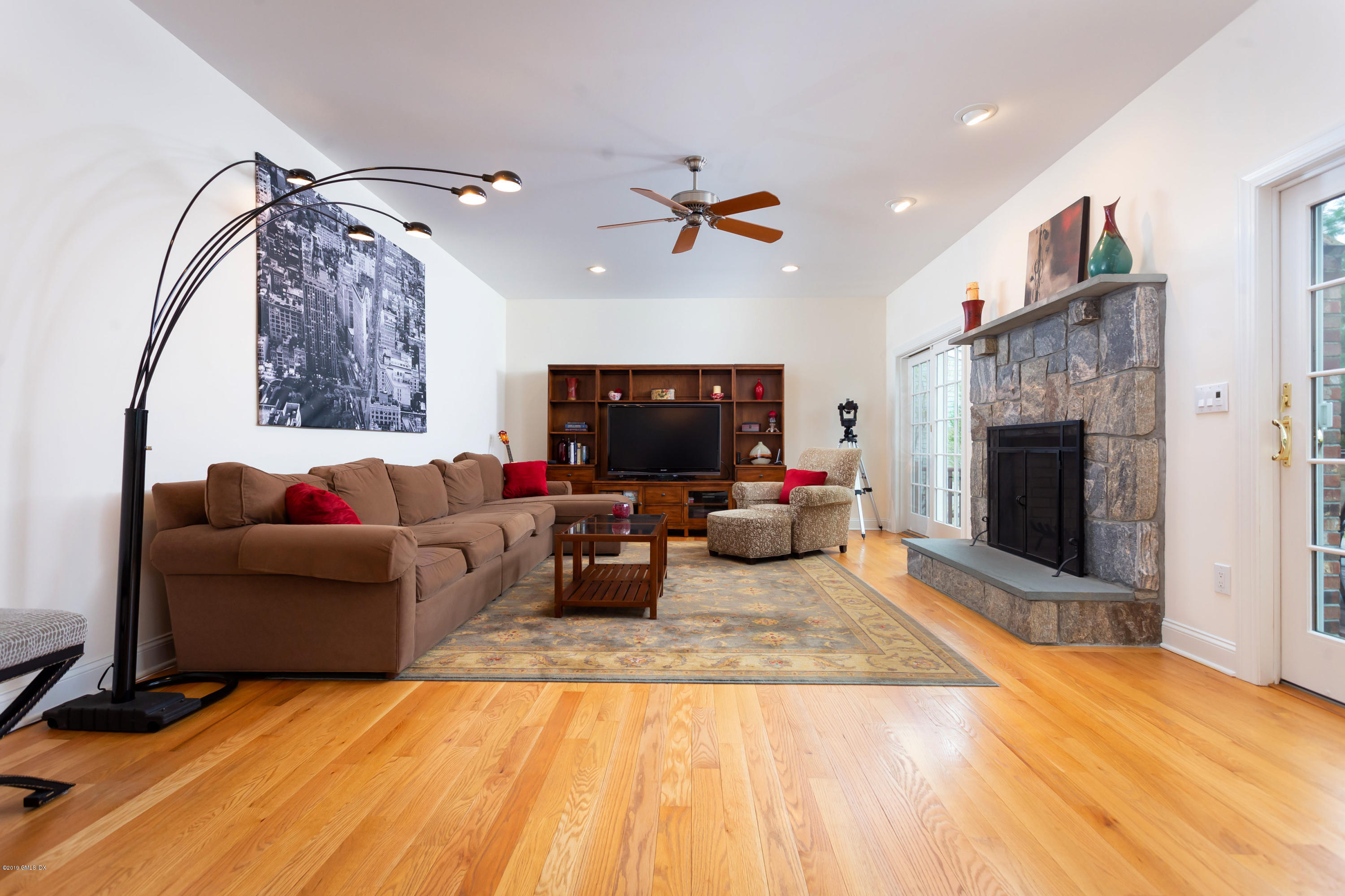 11 Tory Road Riverside, CT 06878 - Photo 13 of 29 a living room with furniture and a fireplace