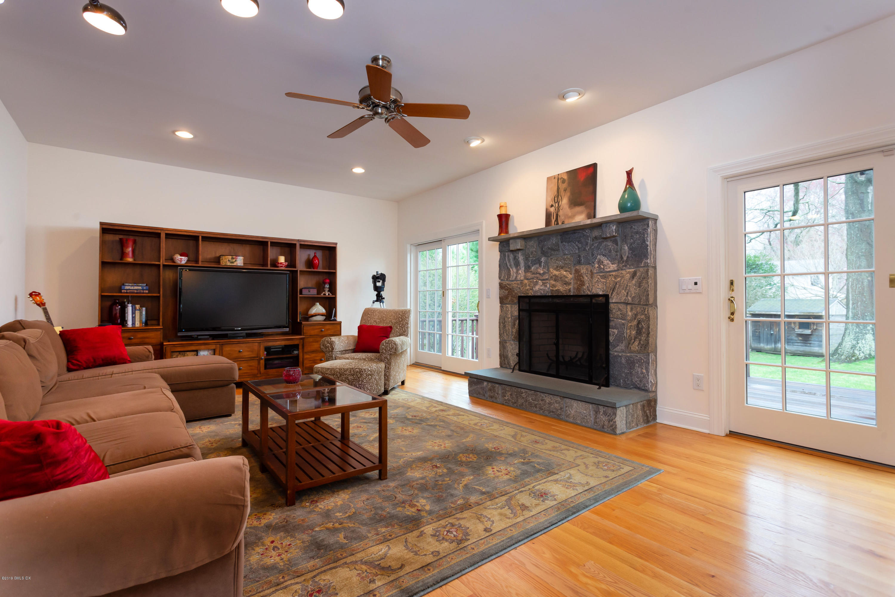 11 Tory Road Riverside, CT 06878 - Photo 14 of 29 a living room with furniture and a fireplace