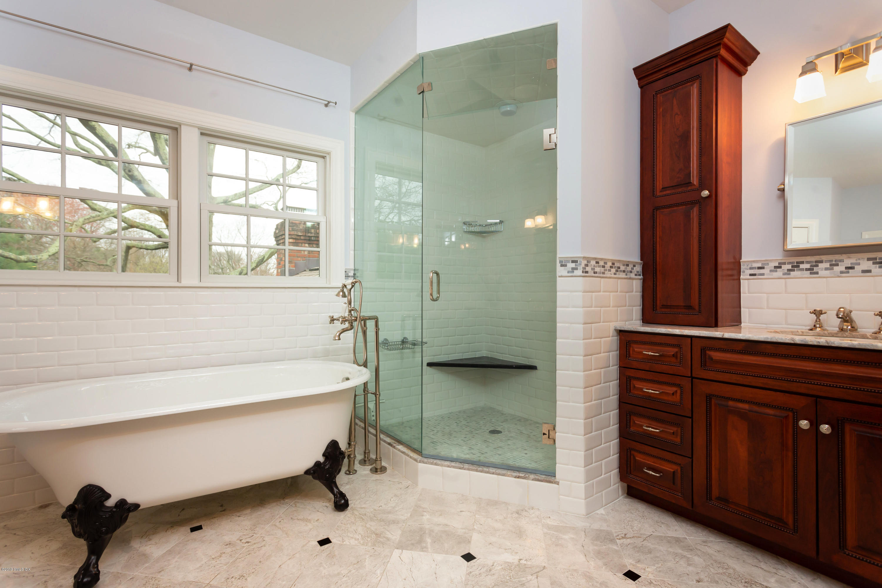 11 Tory Road Riverside, CT 06878 - Photo 16 of 29 a bathroom with a tub sink shower and mirror