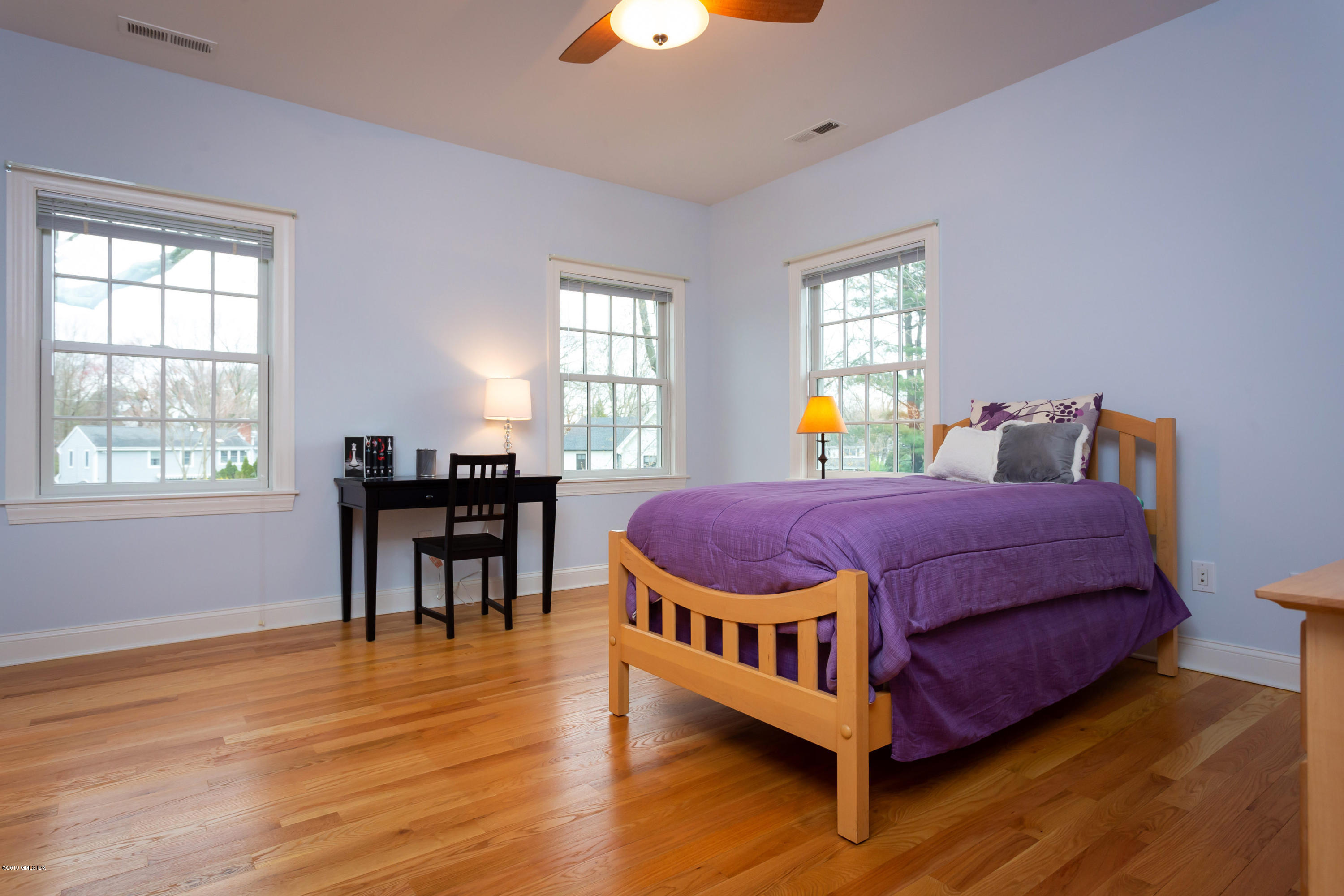 11 Tory Road Riverside, CT 06878 - Photo 18 of 29 a bed room with a bed and a table
