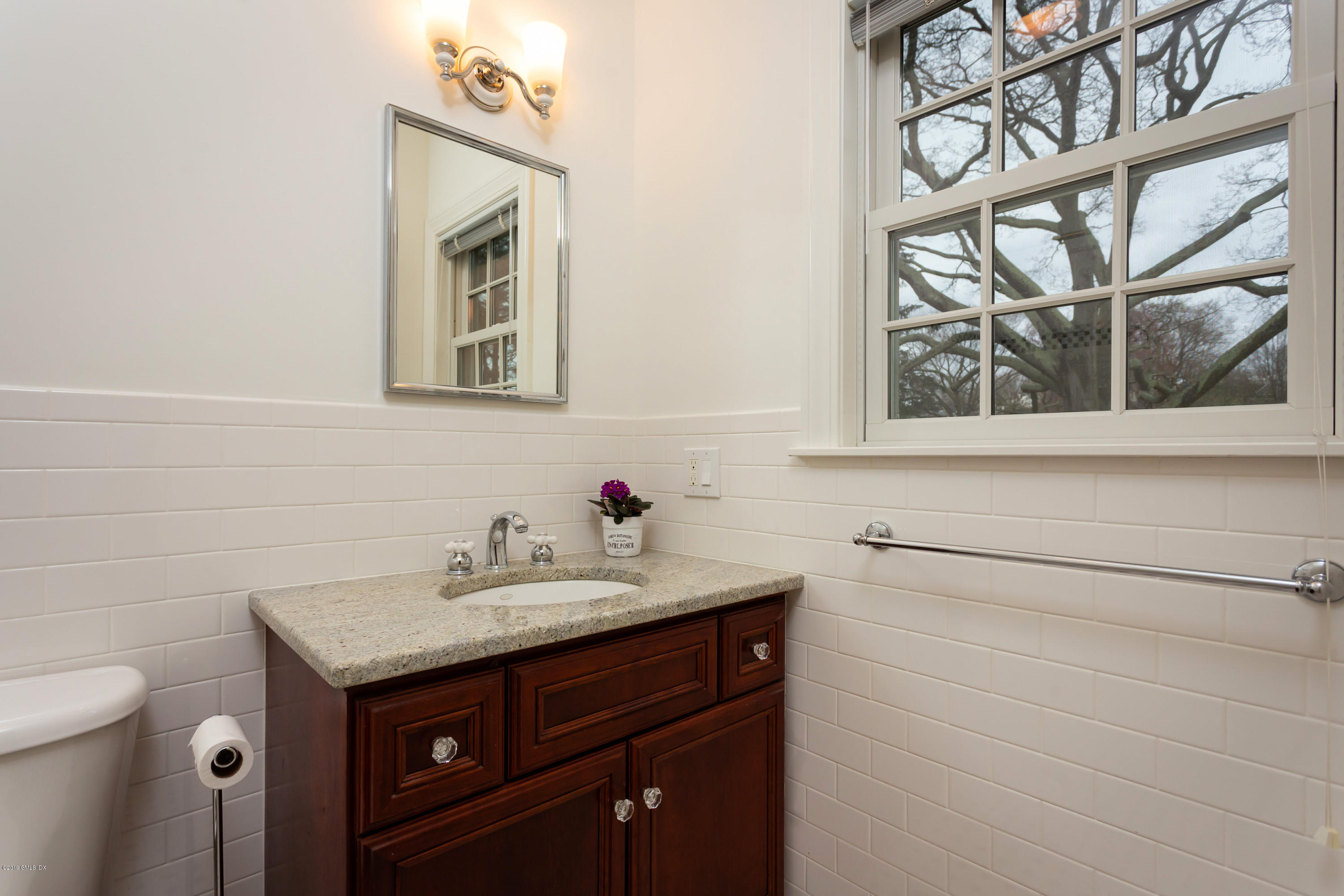 11 Tory Road Riverside, CT 06878 - Photo 21 of 29 a bathroom with a sink and a mirror