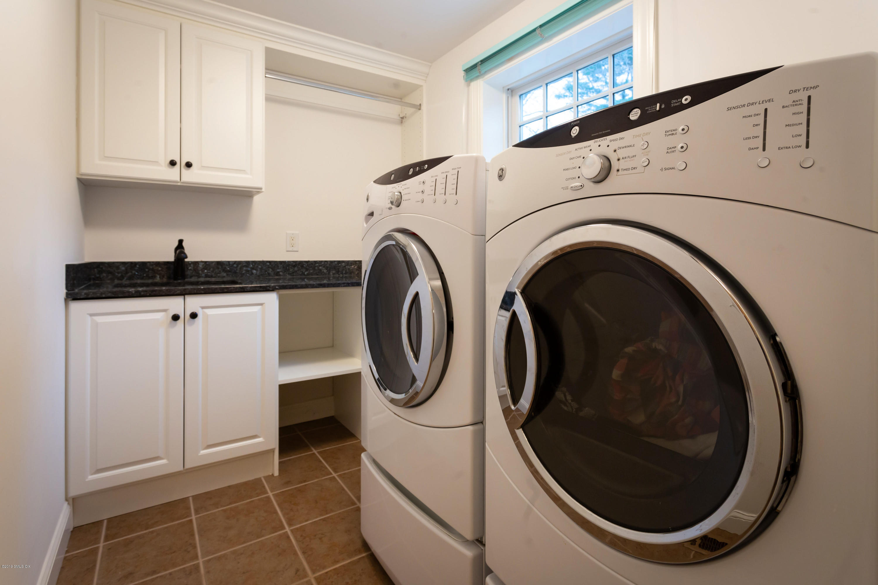 11 Tory Road Riverside, CT 06878 - Photo 24 of 29 a utility room with dryer and washer
