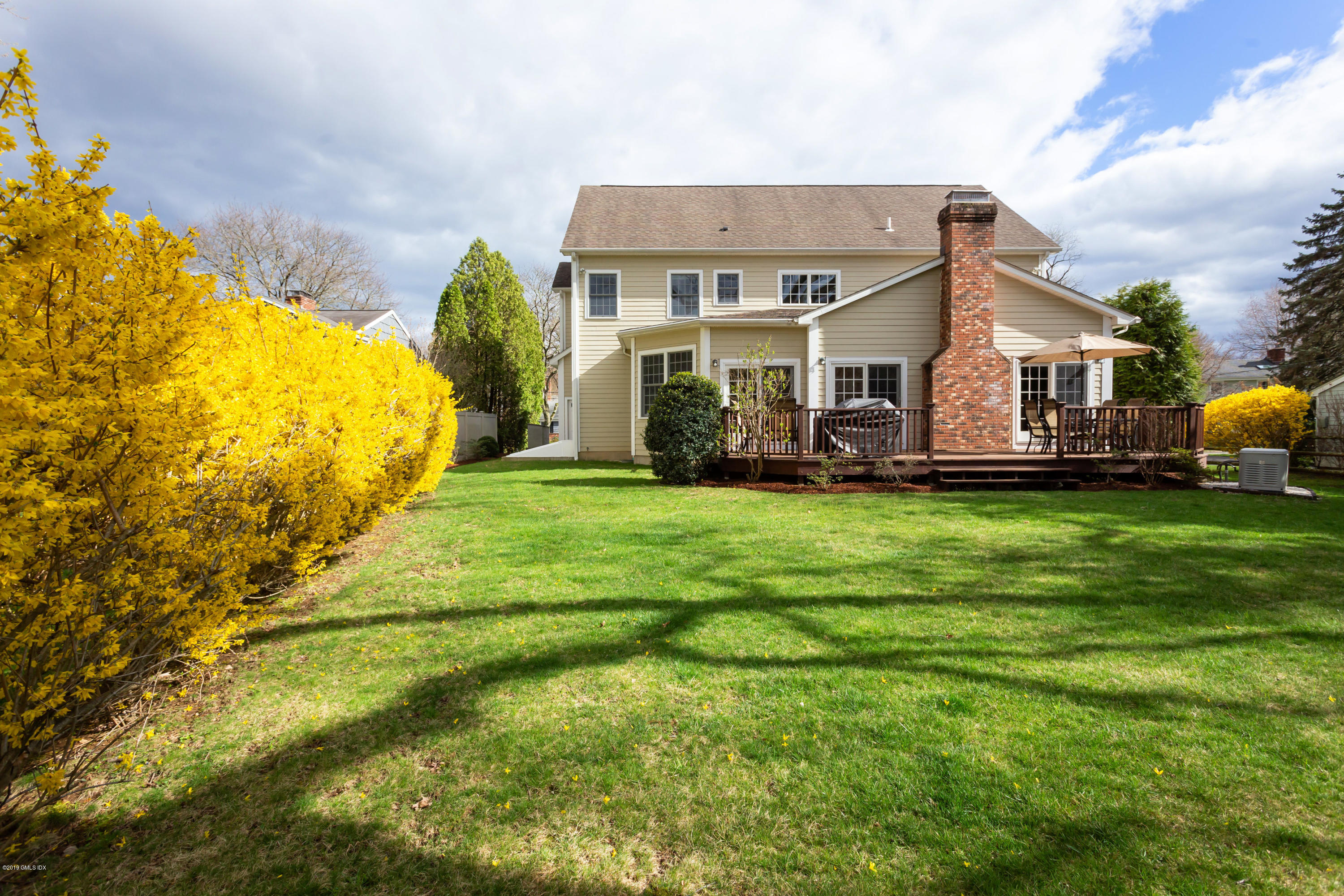 11 Tory Road Riverside, CT 06878 - Photo 28 of 29 a front view of a house with a garden
