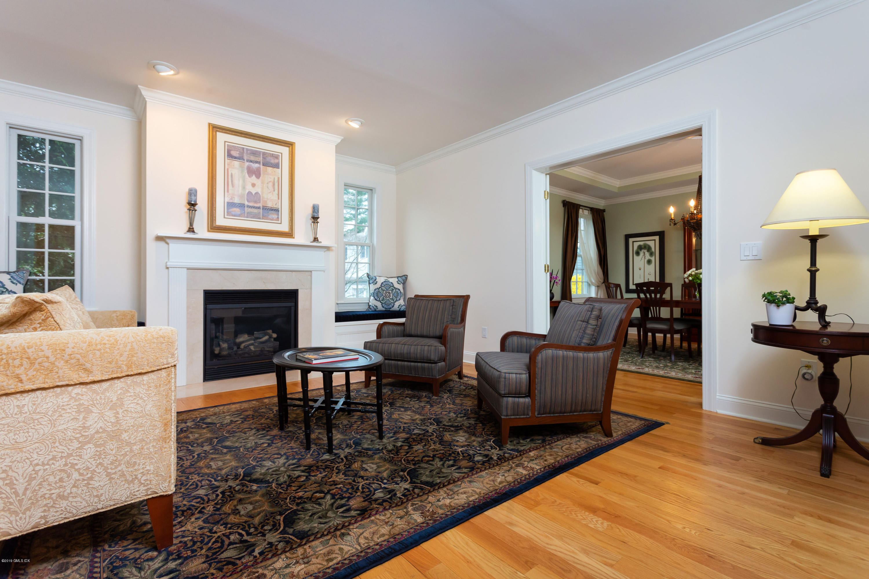 11 Tory Road Riverside, CT 06878 - Photo 3 of 29 a living room with furniture and a fireplace