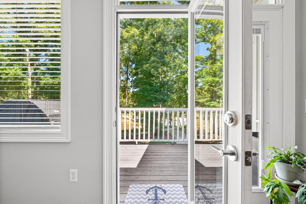 217 Maret Road Townville, SC 29689 - Photo 19 of 35 Step out onto the deck from the master for serene water views