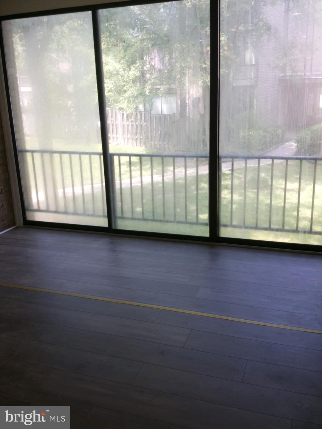 8685 Greenbelt Road, Unit 102 Greenbelt, MD 20770 - Photo 3 of 15 a view of a large window with an outdoor space