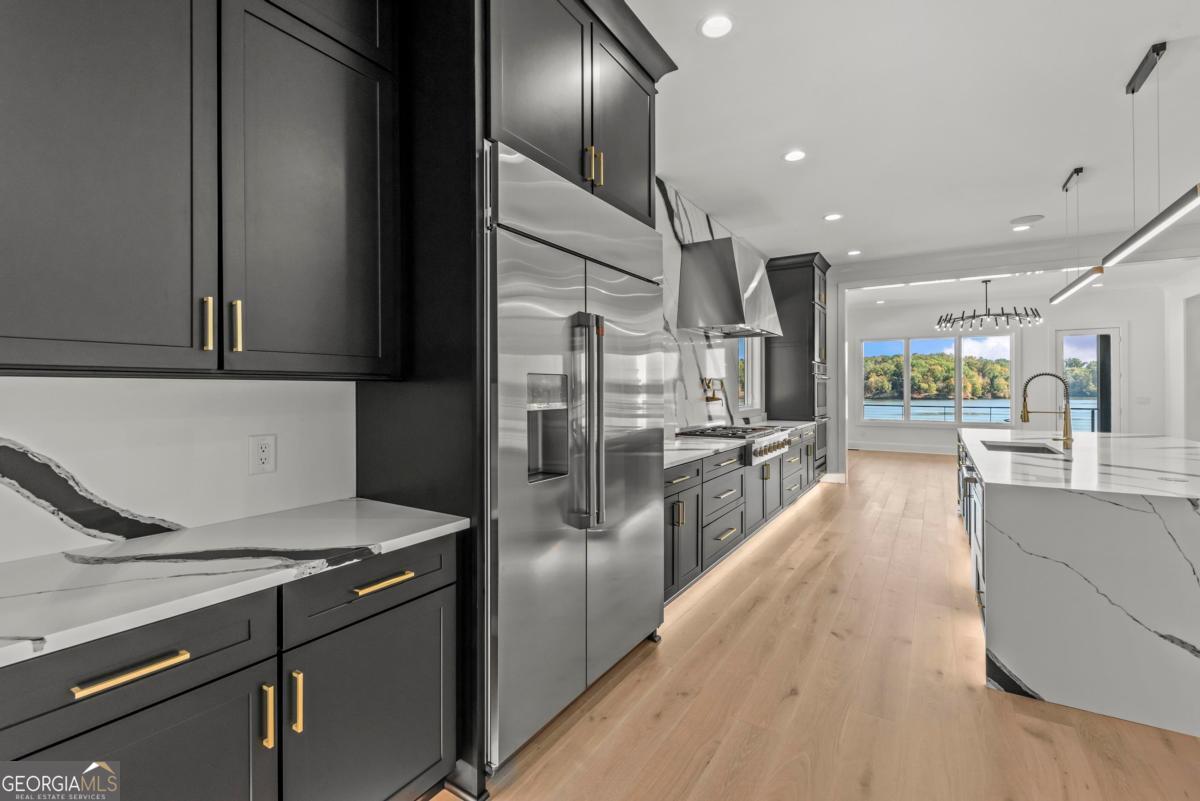 1089 B Crooked Creek Road Eatonton, GA 31024 - Photo 13 of 74 a view of a kitchen with a sink
