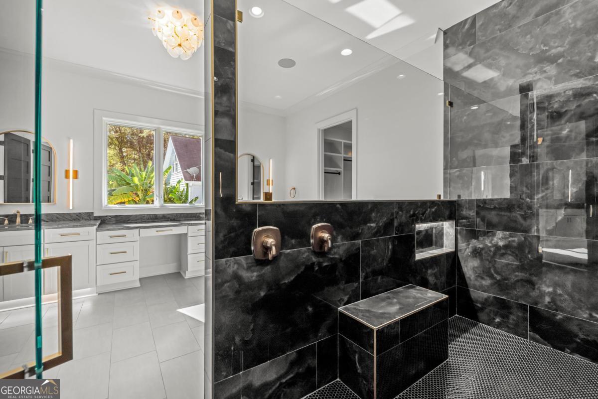 1089 B Crooked Creek Road Eatonton, GA 31024 - Photo 26 of 74 a bathroom with a sink and a mirror