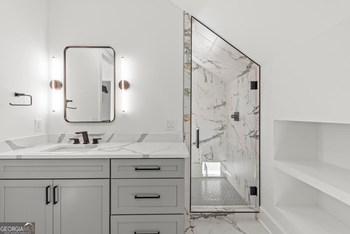 1089 B Crooked Creek Road Eatonton, GA 31024 - Photo 53 of 74 a bathroom with a double vanity sink mirror and shower