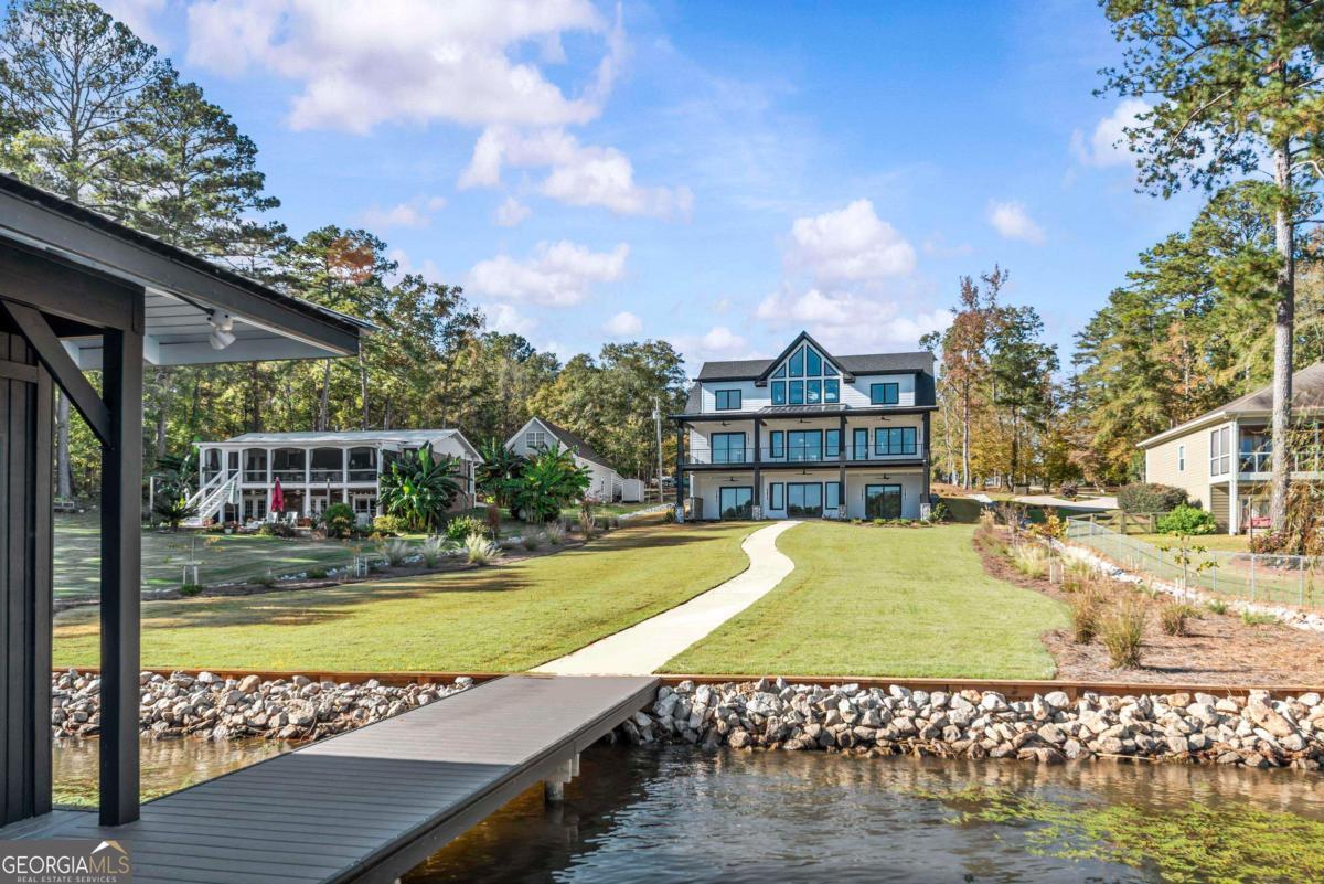 1089 B Crooked Creek Road Eatonton, GA 31024 - Photo 67 of 74 a view of a swimming pool with a patio