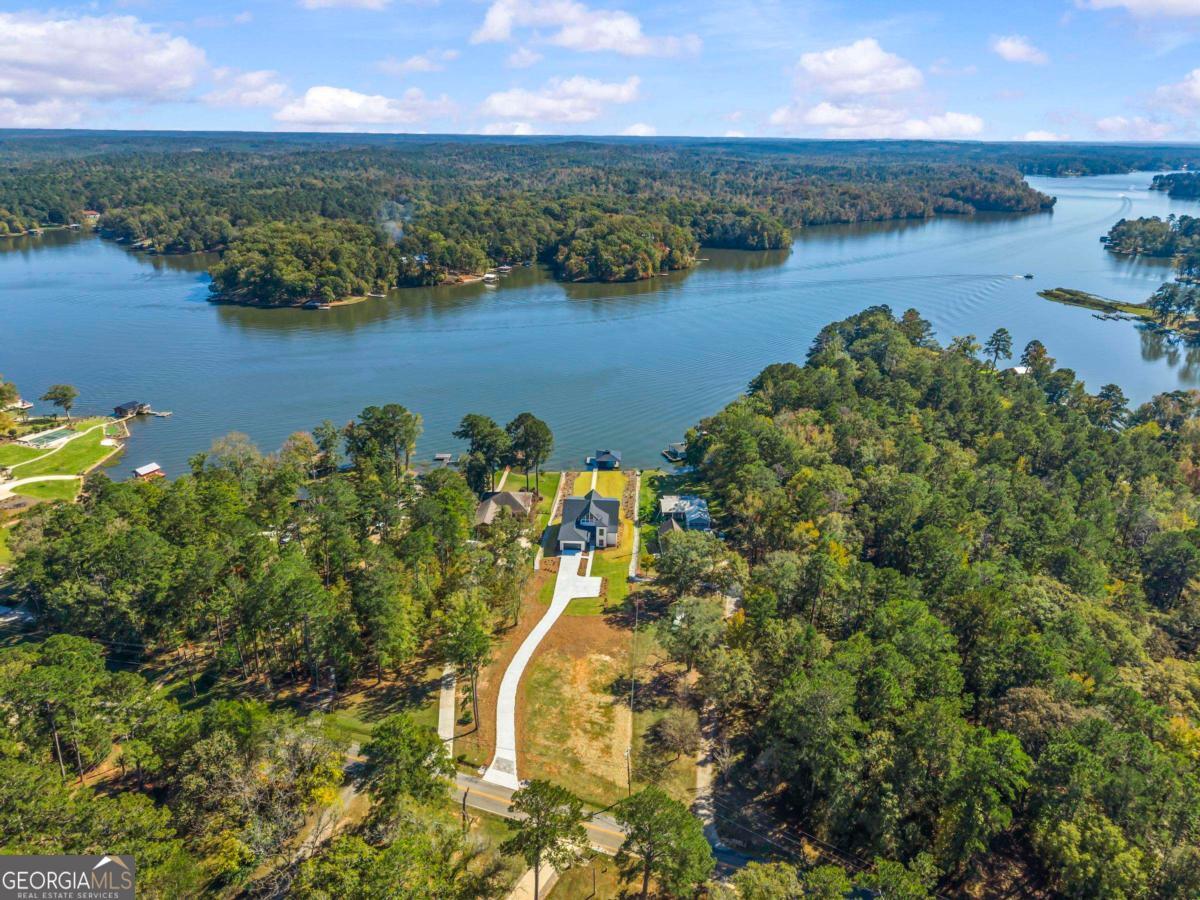 1089 B Crooked Creek Road Eatonton, GA 31024 - Photo 73 of 74 an aerial view of ocean with residential house with outdoor space and seating around