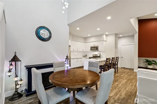 a bedroom with a bed and a table