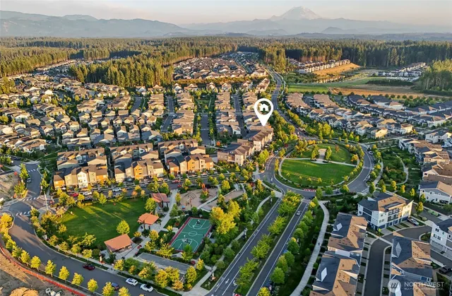 a view of a lake with a house in the background