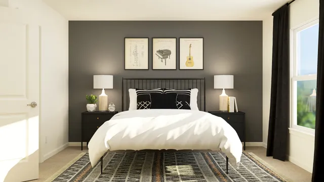 a bed sitting in a bedroom next to a window and a fireplace