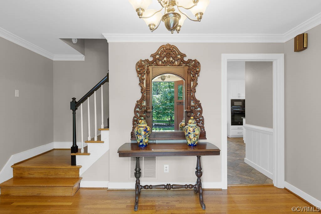 2370 Castlebridge Road Midlothian, VA 23113 - Photo 3 of 47 a view of hall way with furniture and wooden floor