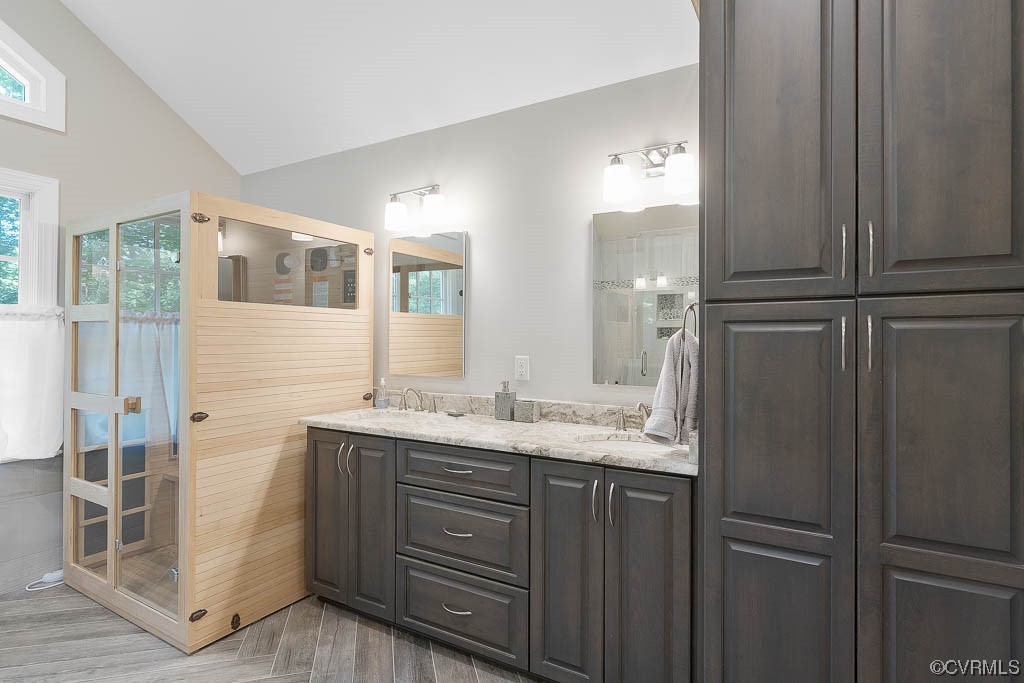 2370 Castlebridge Road Midlothian, VA 23113 - Photo 31 of 47 a bathroom with a granite countertop sink and a mirror