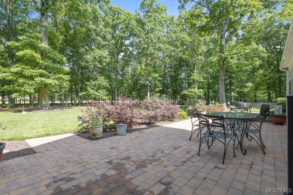 2370 Castlebridge Road Midlothian, VA 23113 - Photo 39 of 47 a view of a backyard with sitting area