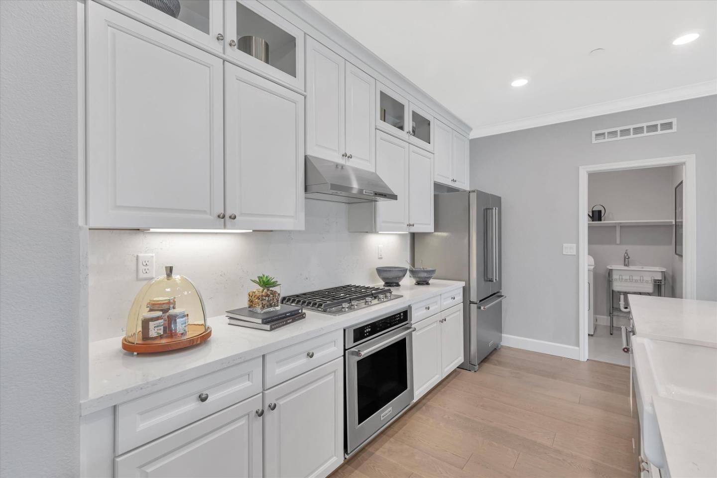 2740 Glenview Drive Hollister, CA 95023 - Photo 17 of 62 a kitchen with stainless steel appliances granite countertop a refrigerator and a stove top oven