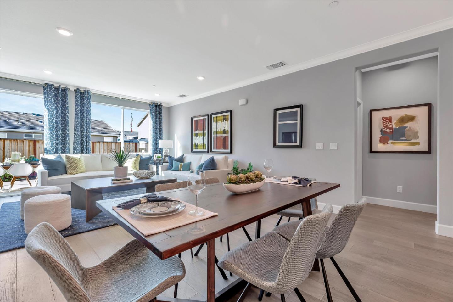 2740 Glenview Drive Hollister, CA 95023 - Photo 22 of 62 a view of a dining room and livingroom view with furniture wooden floor and a rug