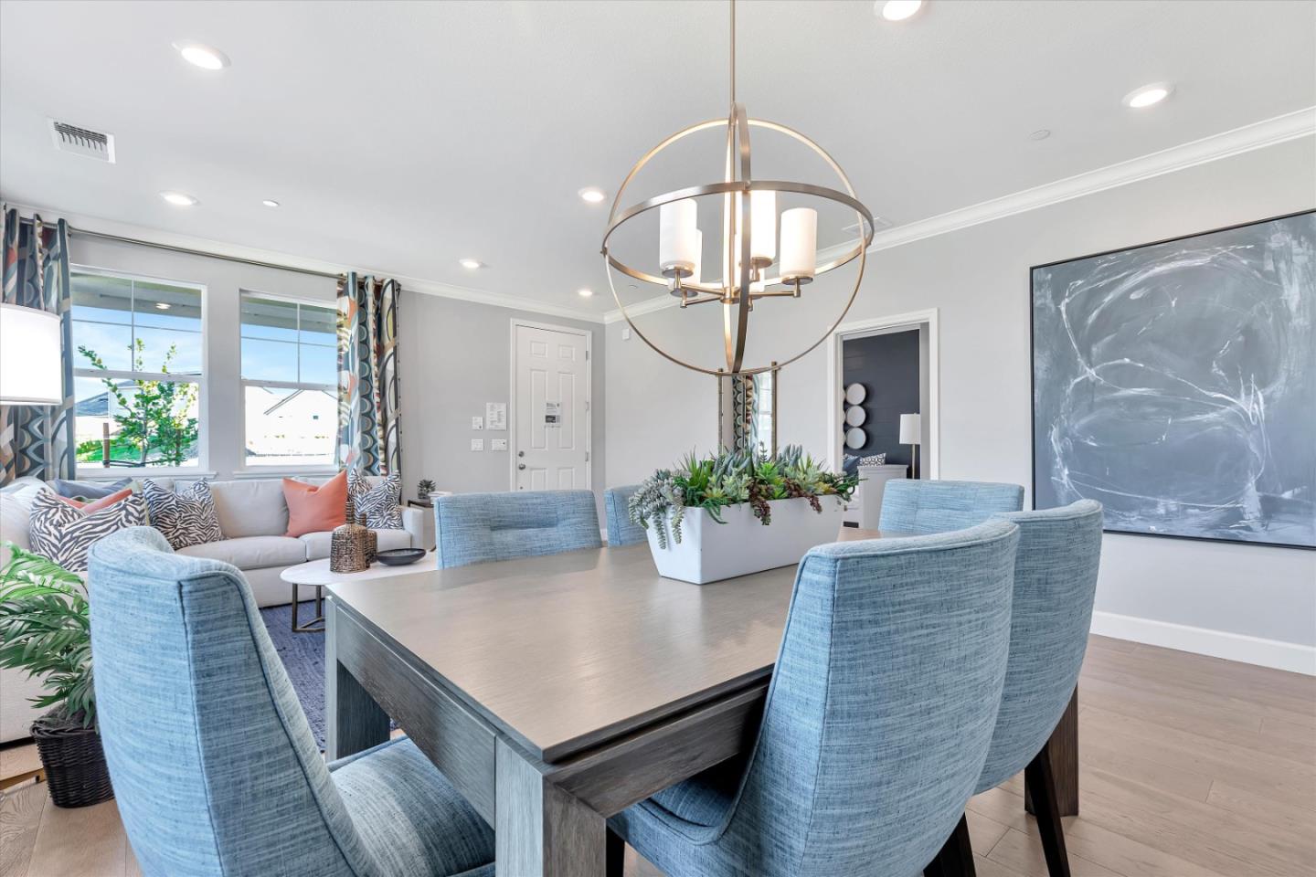 2740 Glenview Drive Hollister, CA 95023 - Photo 26 of 62 a view of a dining room with furniture a chandelier and wooden floor