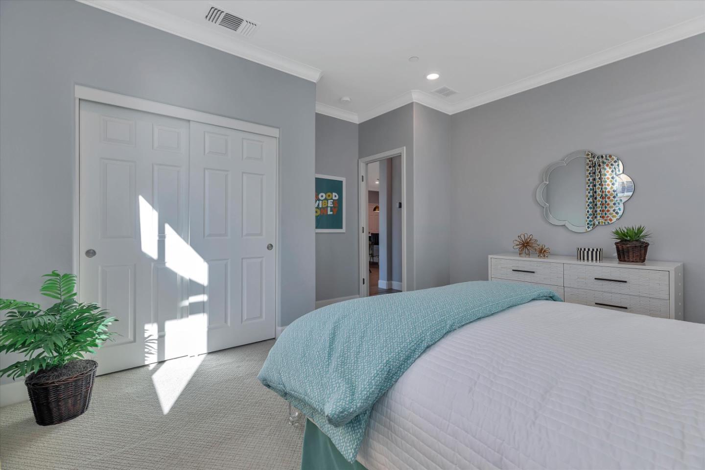 2740 Glenview Drive Hollister, CA 95023 - Photo 33 of 62 a bedroom with a balcony a bed and a potted plant