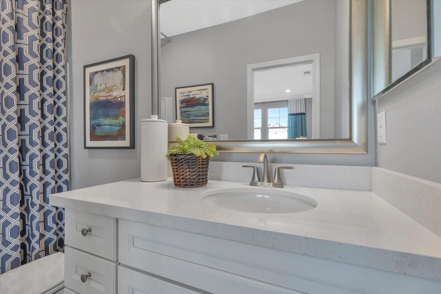 2740 Glenview Drive Hollister, CA 95023 - Photo 45 of 62 a bathroom with a sink and a mirror