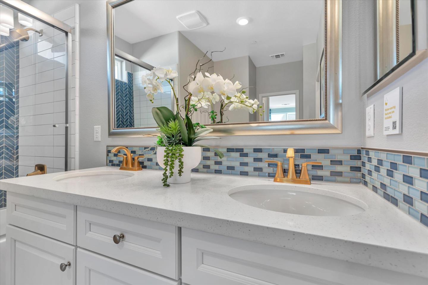2740 Glenview Drive Hollister, CA 95023 - Photo 50 of 62 a bathroom with a sink a vanity and a mirror