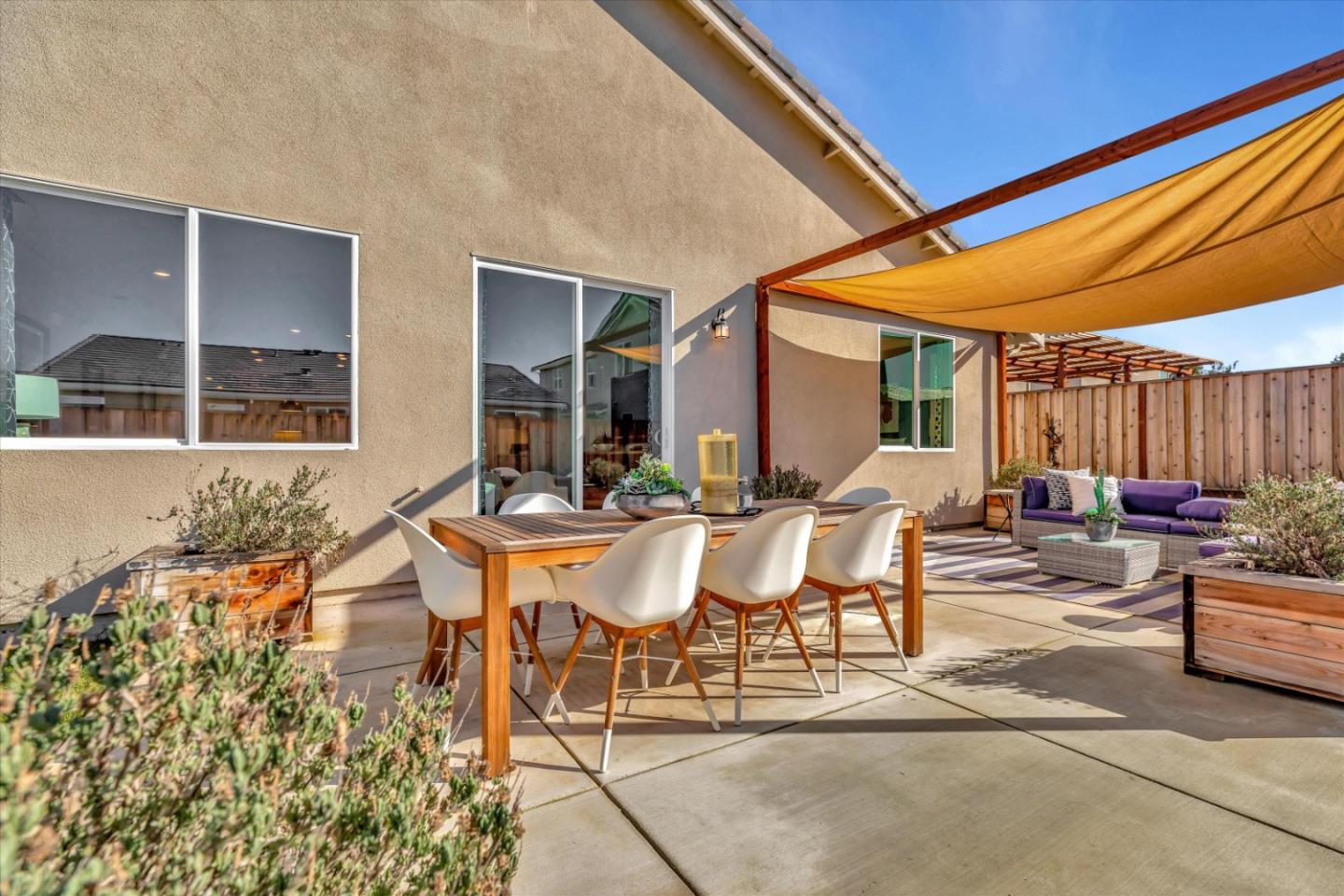 2740 Glenview Drive Hollister, CA 95023 - Photo 55 of 62 a view of a patio with table and chairs with wooden floor and fence
