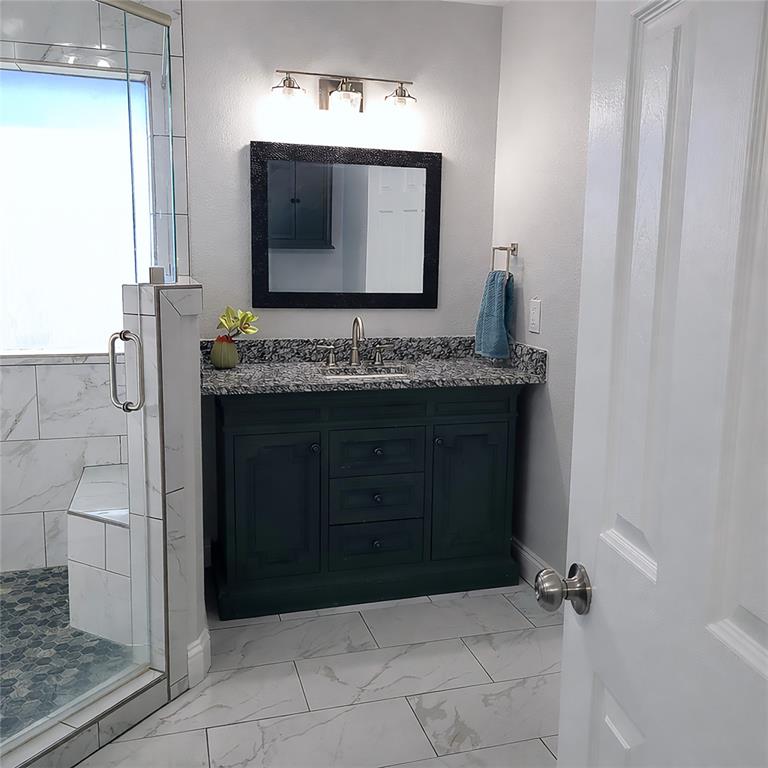 406 Epps Road Palmer, TX 75152 - Photo 24 of 40 Right-side furniture-style vanity.