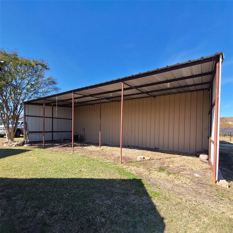406 Epps Road Palmer, TX 75152 - Photo 8 of 40 Equipment ShedIdeal covered storage for outdoor tools, toys, and equipment.