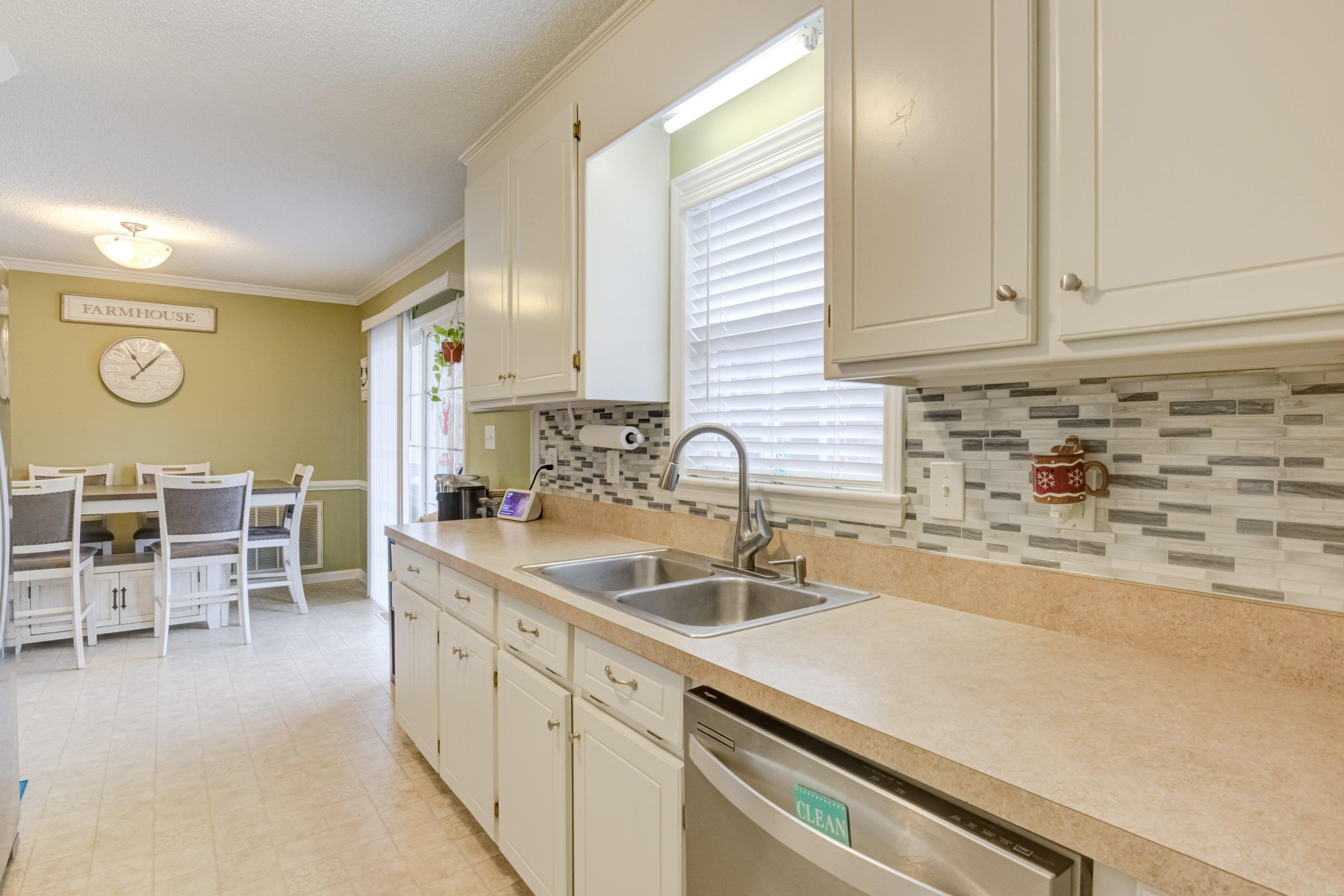 4245 Bizzell Grove Church Road Princeton, NC 27569 - Photo 13 of 30 a kitchen with a sink and cabinets