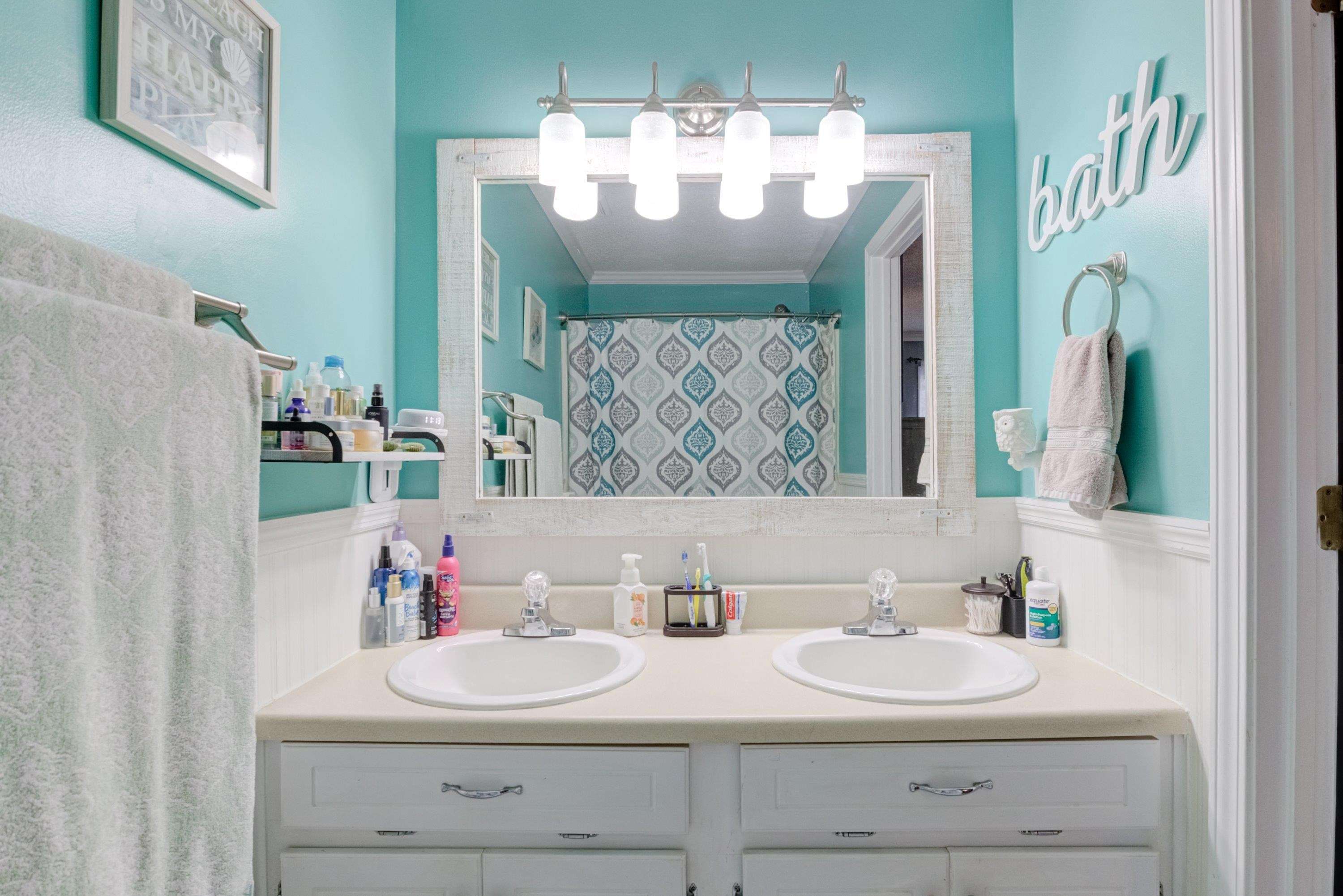 4245 Bizzell Grove Church Road Princeton, NC 27569 - Photo 20 of 30 a bathroom with a sink and a mirror