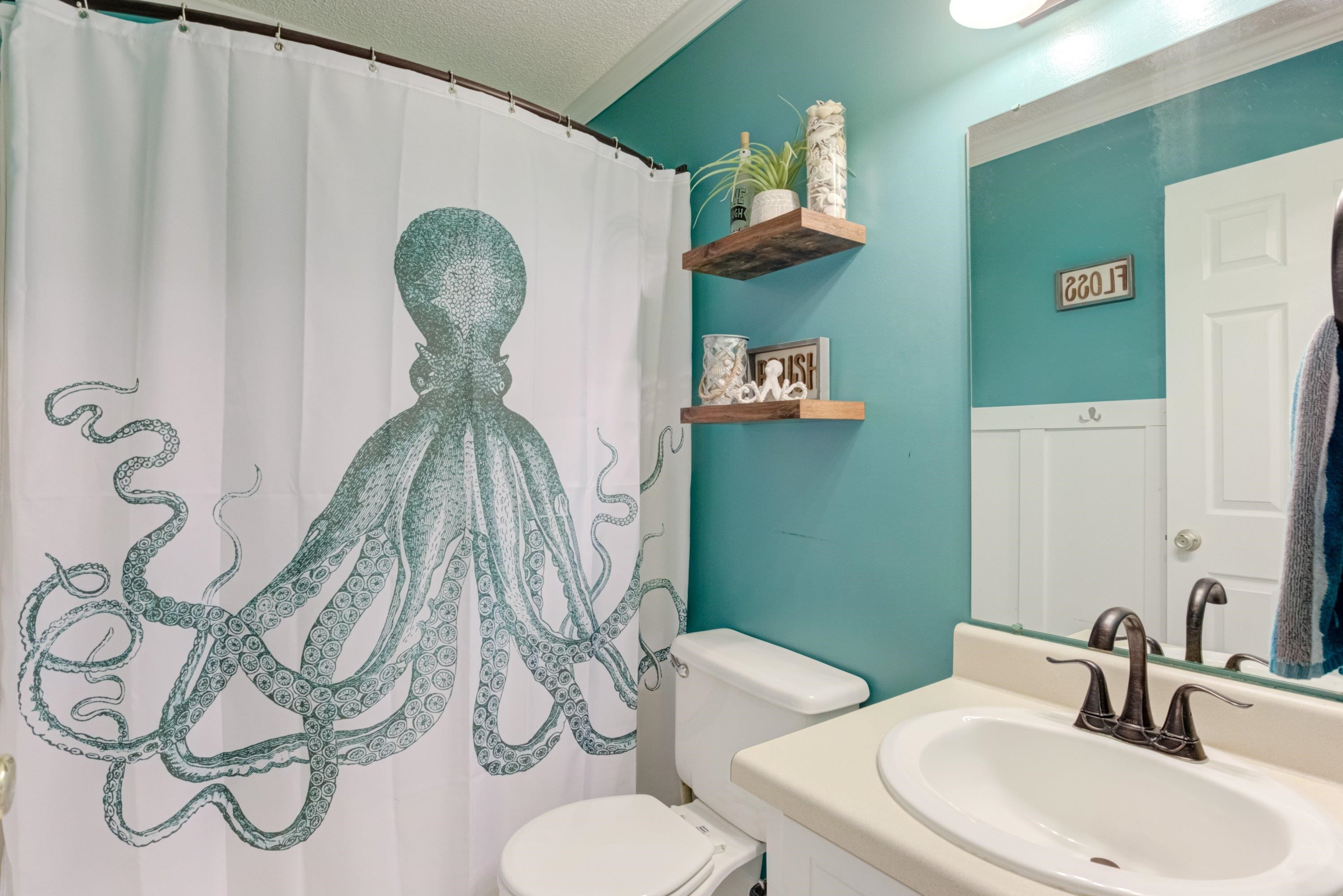 4245 Bizzell Grove Church Road Princeton, NC 27569 - Photo 23 of 30 a bathroom with a toilet sink and mirror