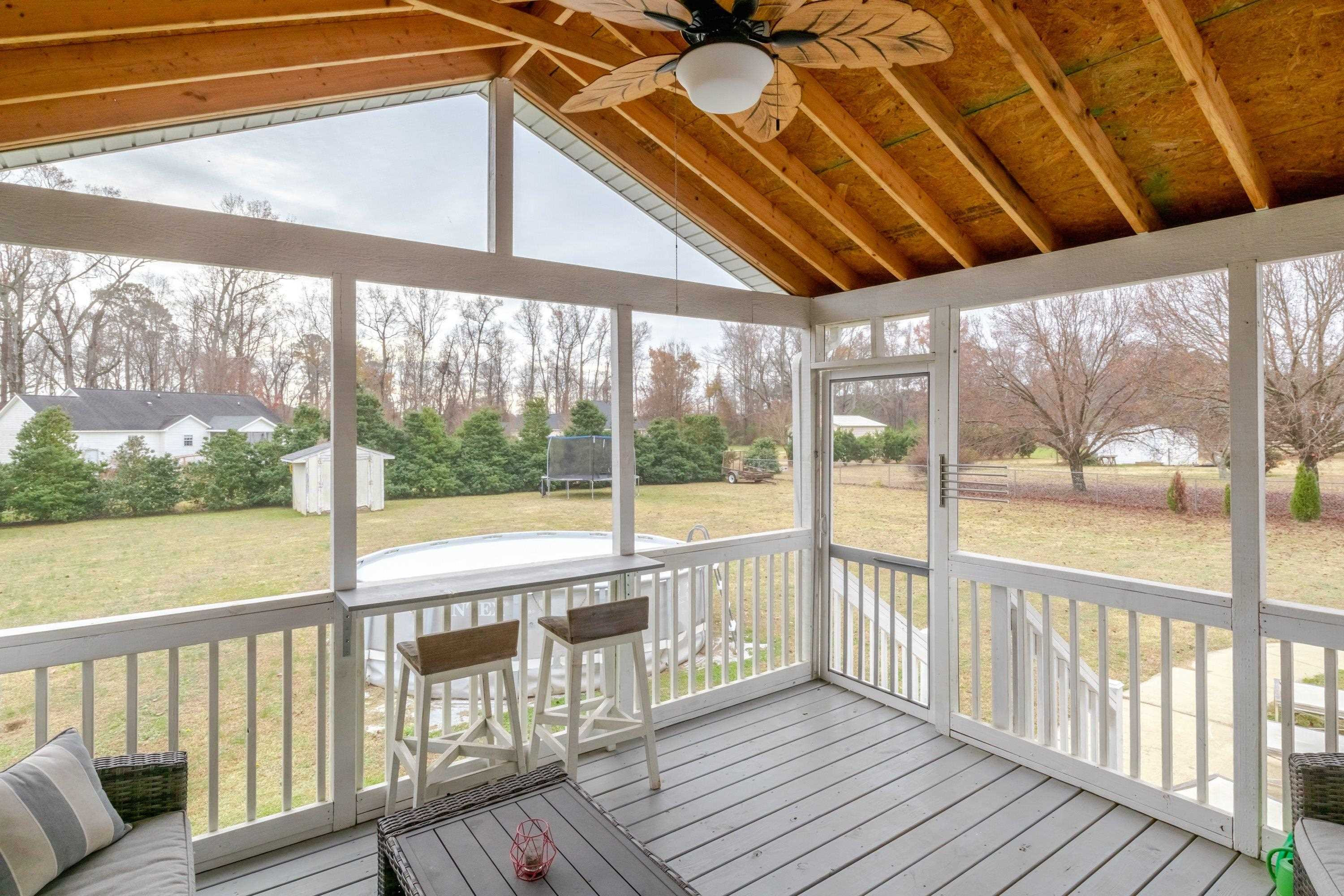 4245 Bizzell Grove Church Road Princeton, NC 27569 - Photo 25 of 30 a view of a balcony with wooden floor