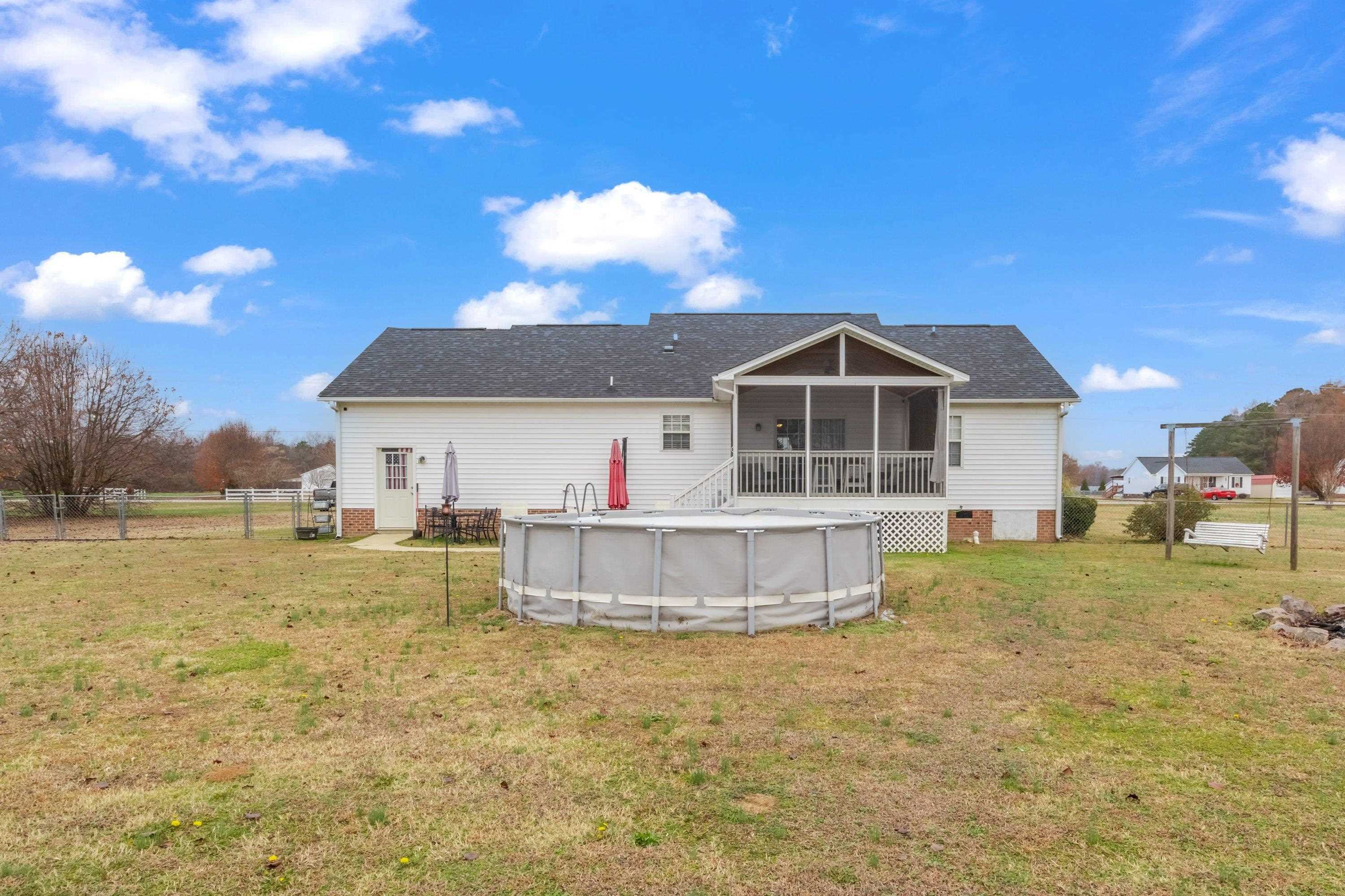 4245 Bizzell Grove Church Road Princeton, NC 27569 - Photo 27 of 30 a front view of a house with a yard