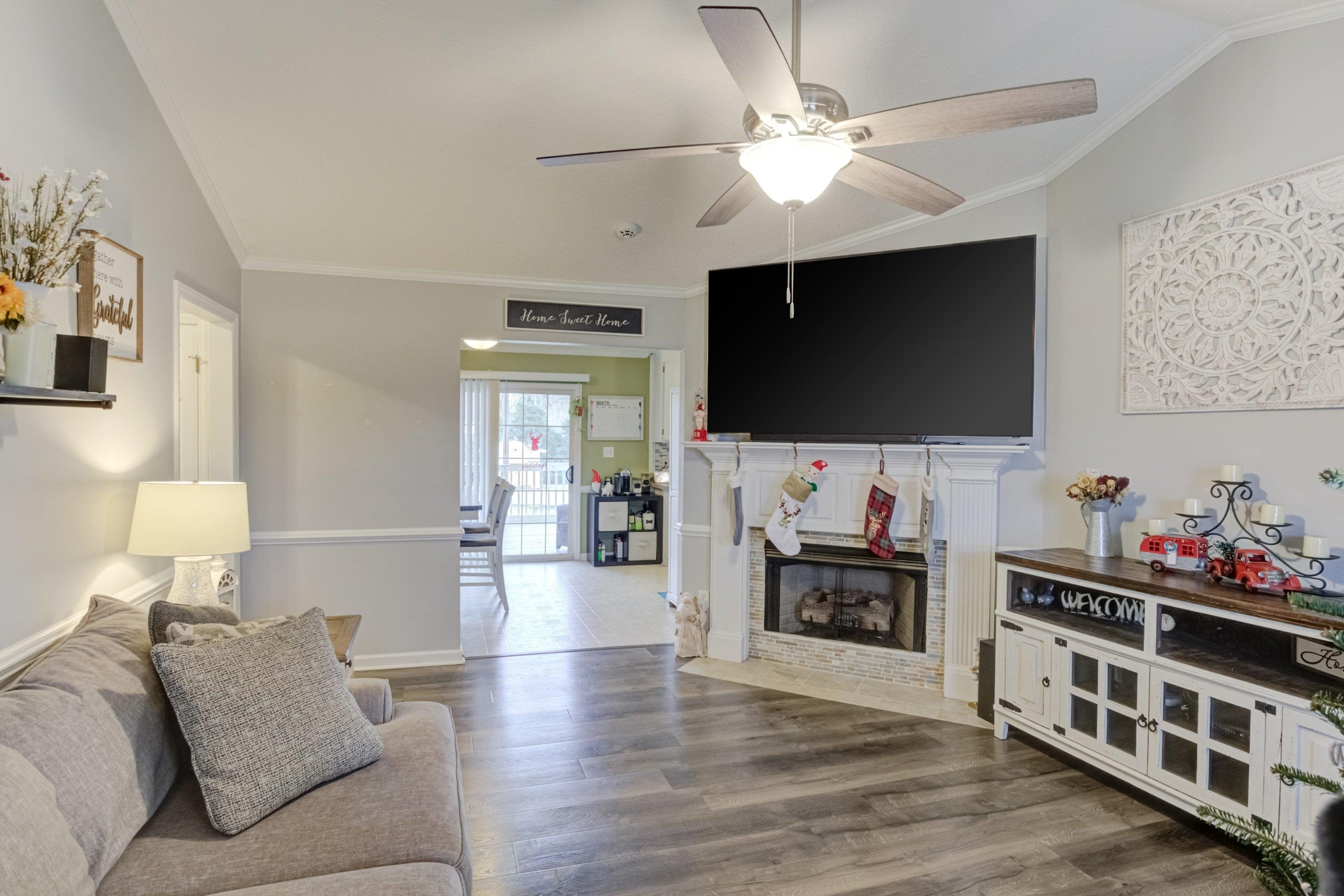 4245 Bizzell Grove Church Road Princeton, NC 27569 - Photo 5 of 30 a living room with furniture and a flat screen tv