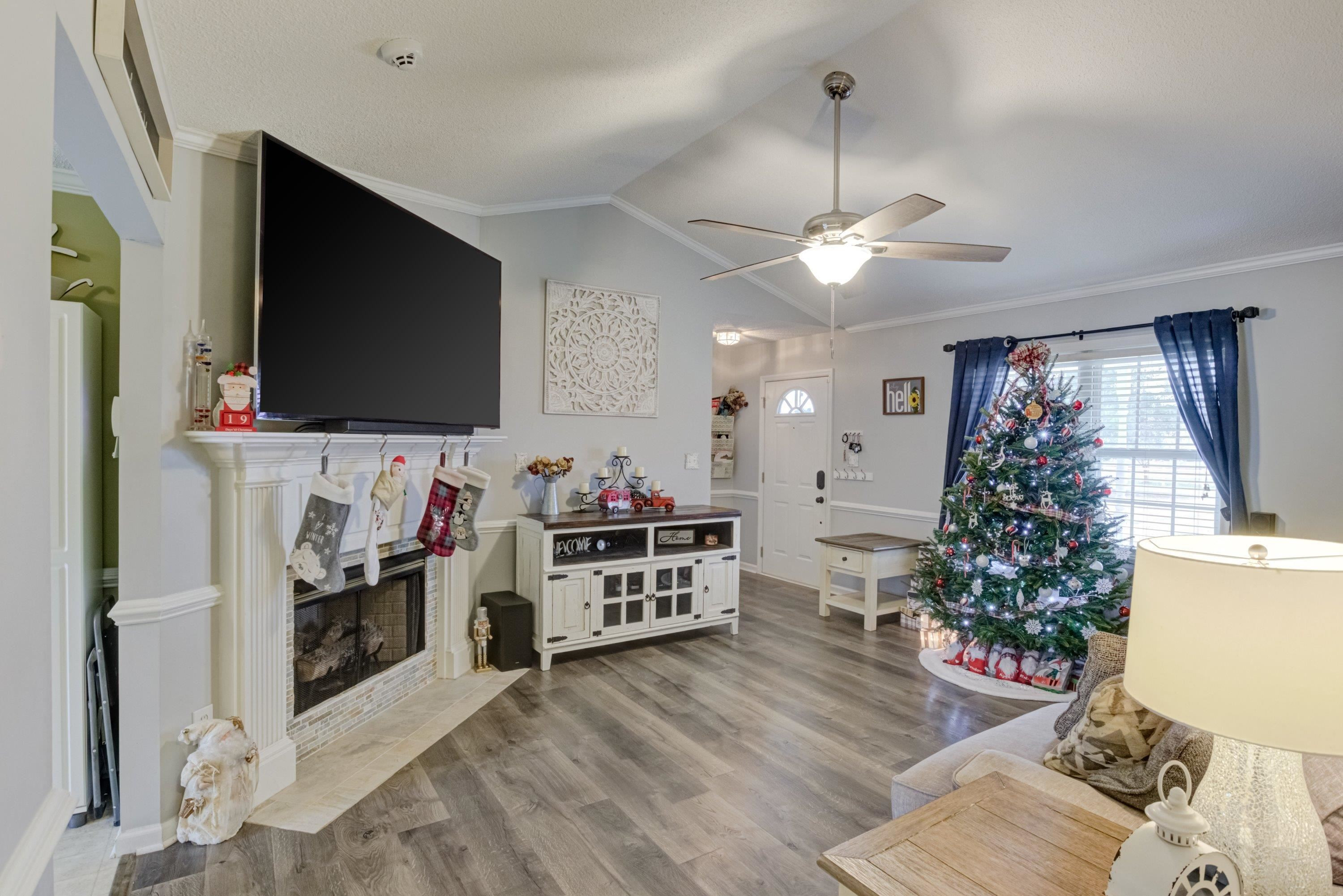 4245 Bizzell Grove Church Road Princeton, NC 27569 - Photo 7 of 30 a living room with furniture and a flat screen tv