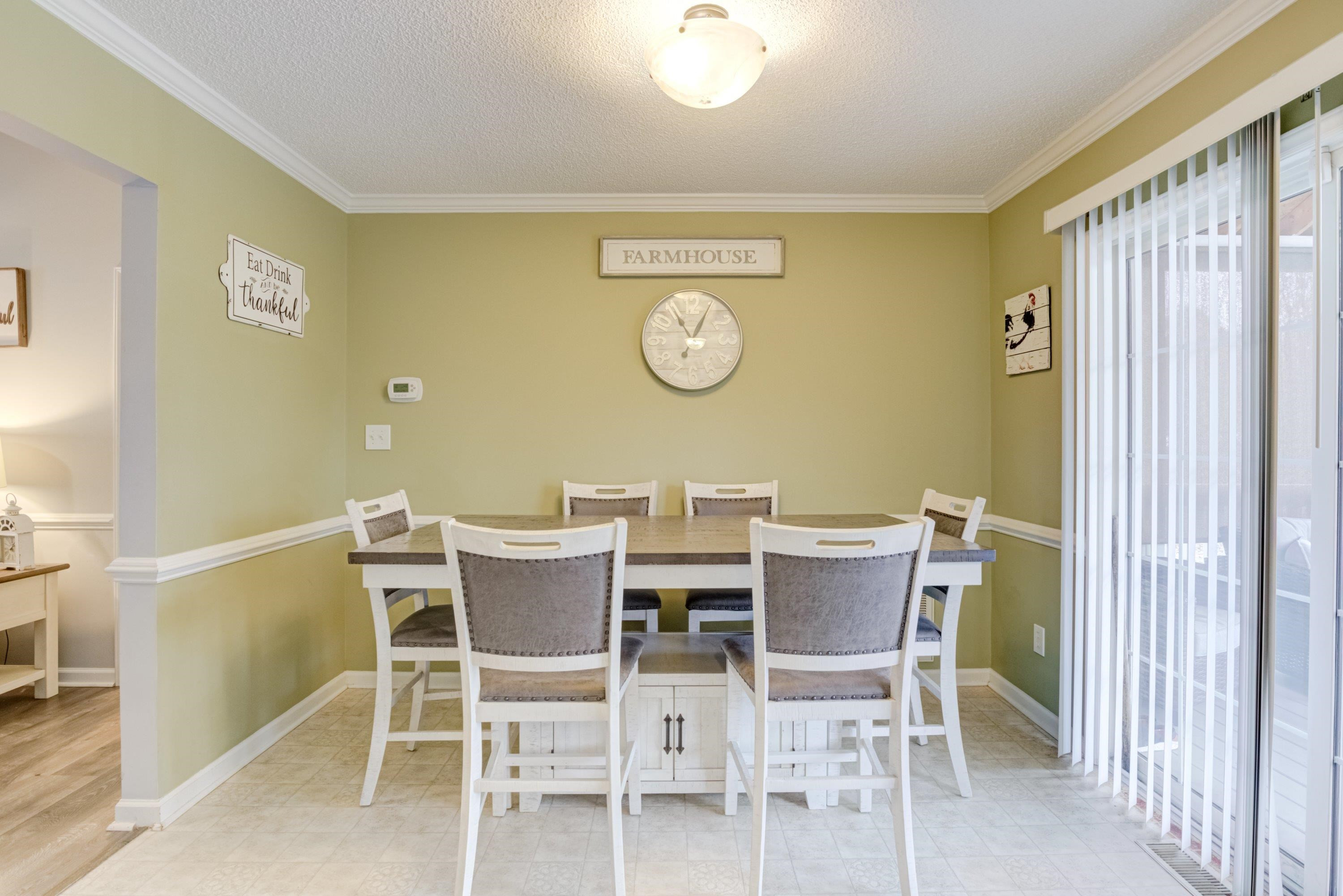 4245 Bizzell Grove Church Road Princeton, NC 27569 - Photo 9 of 30 a view of a dining room with furniture and a window