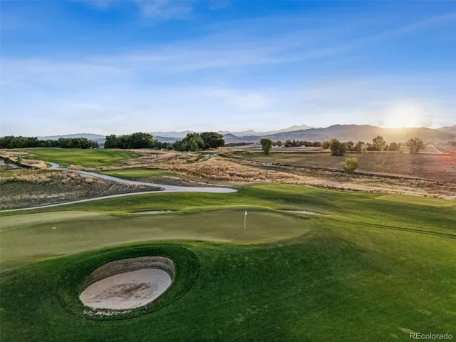 a view of a lake with a yard