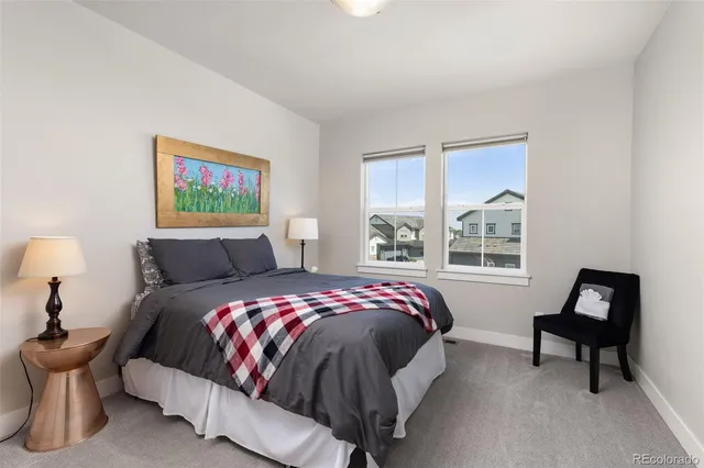 a bathroom with a sink a toilet a tub and shower