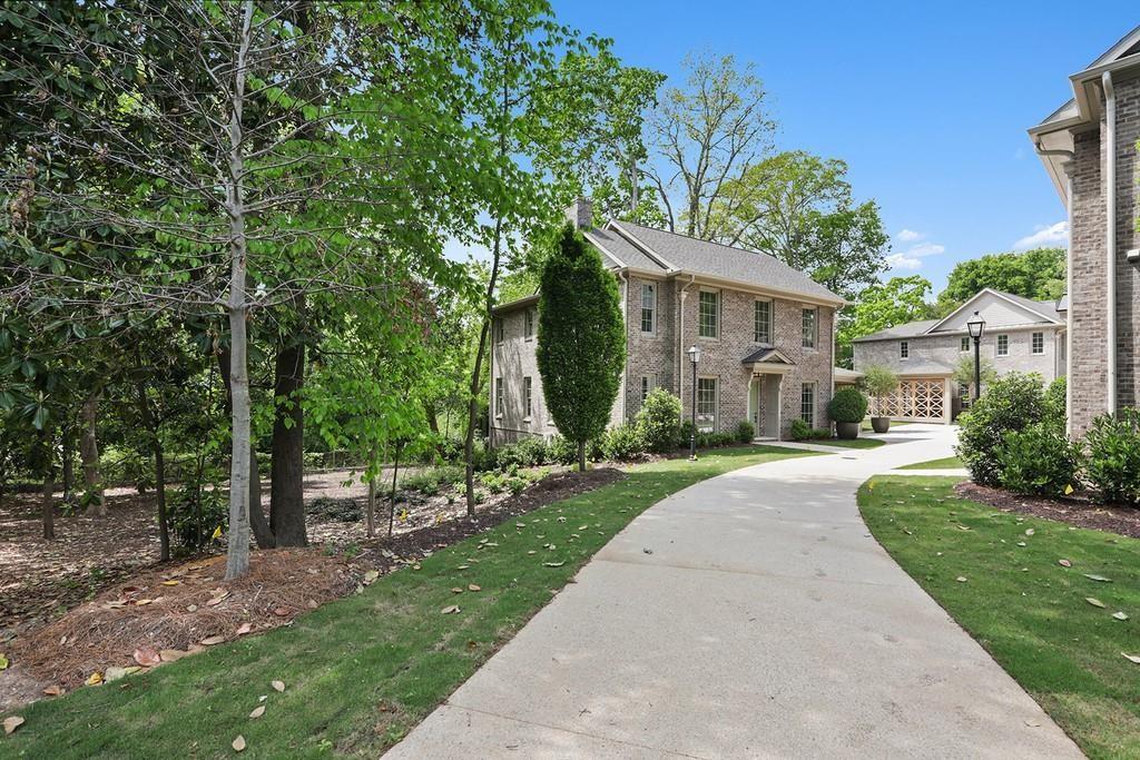 Beautiful private drive to this tucked away gem in the heart of Druid Hills!