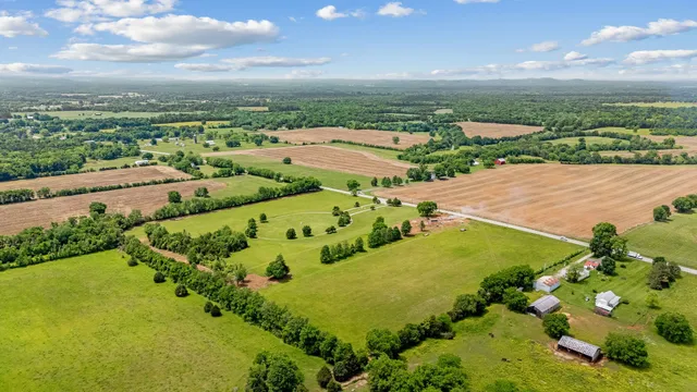 a view of a garden with a building