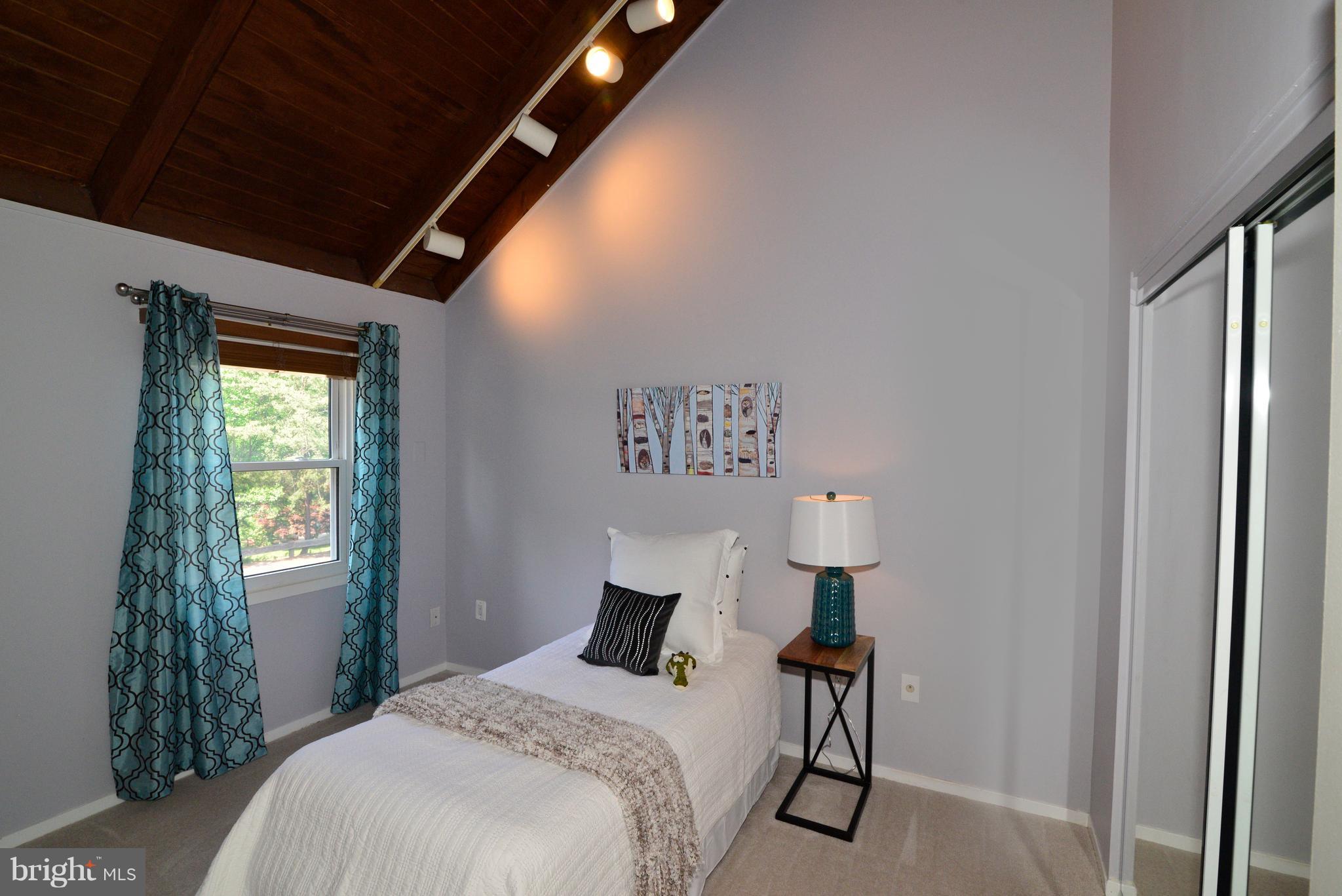 11149 Timberhead Court Reston, VA 20191 - Photo 12 of 30 Bedroom #2 with vaulted ceiling overlooks front.