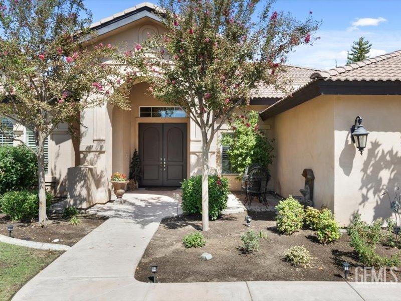 Undisclosed Address Bakersfield, CA 93314 - Photo 4 of 38 a view of a house with a yard
