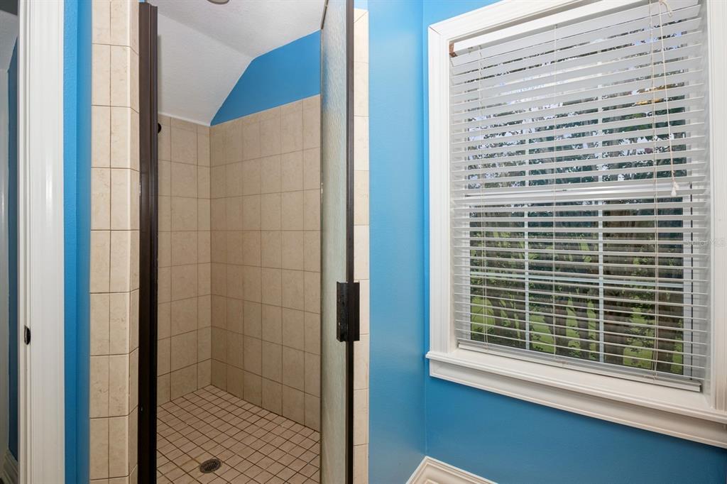 35520 Timbertop Lane Fruitland Park, FL 34731 - Photo 39 of 82 a view of a bathroom that has a window in it
