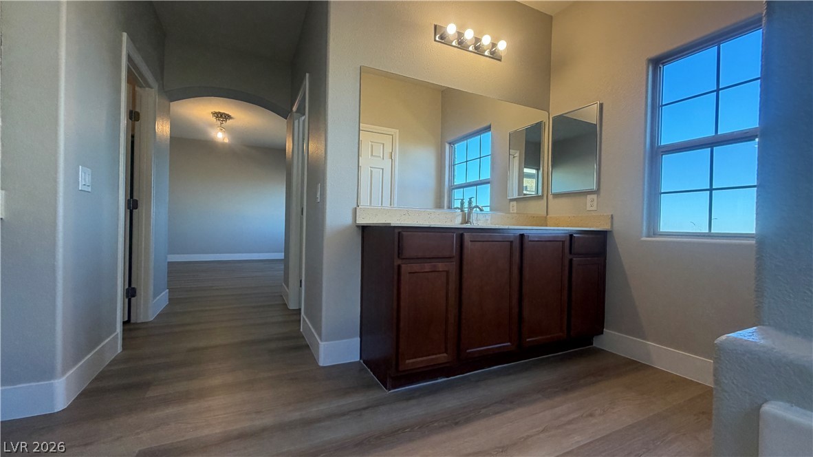 9453 Alma Ridge Avenue Las Vegas, NV 89178 - Photo 17 of 25 A well-appointed vanity with generous countertop space defines this primary bathroom.