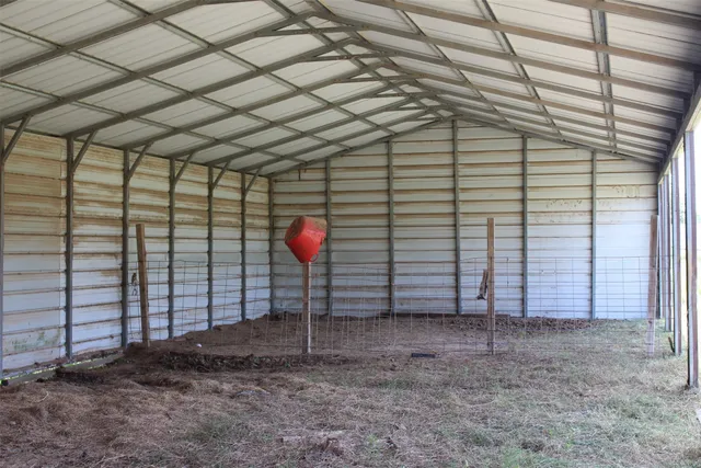 a view of a room with a large window